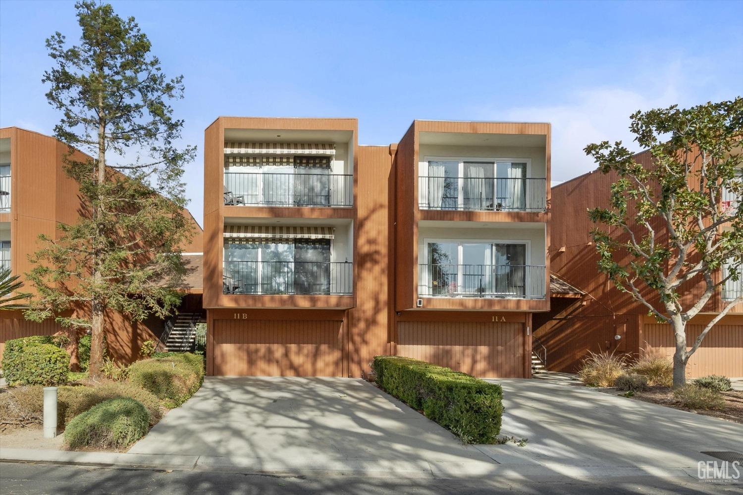 Undisclosed Address Bakersfield, CA 93306 - Photo 11 of 52 a view of a brick house with a large windows