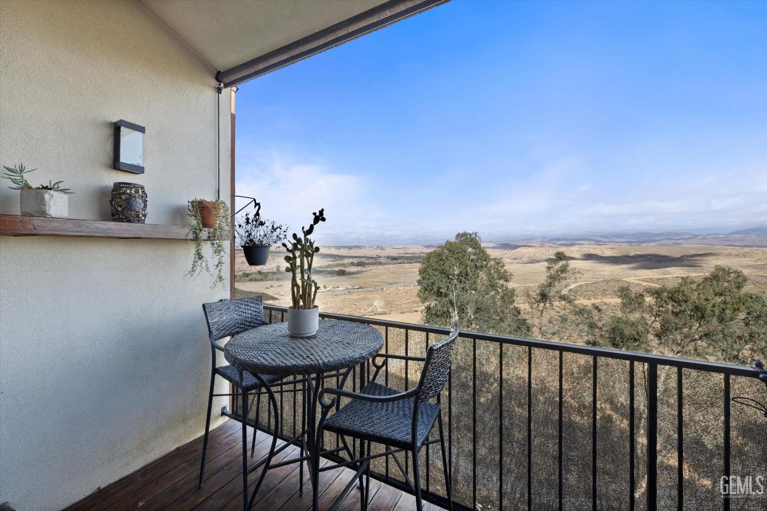 Undisclosed Address Bakersfield, CA 93306 - Photo 18 of 52 a view of a dining room with furniture and wooden floor