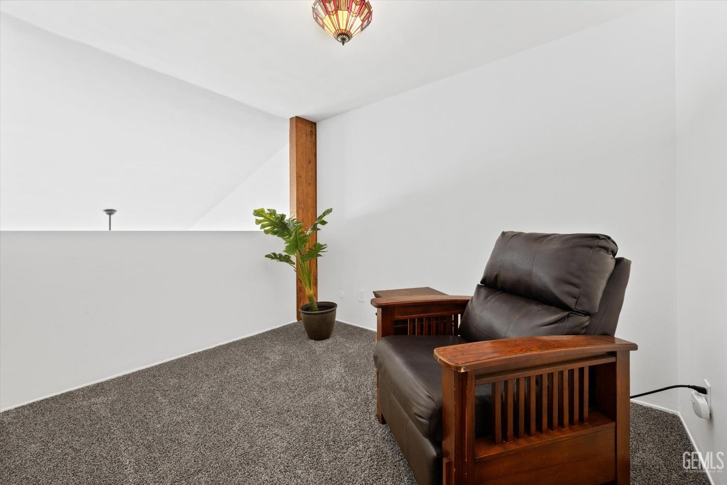 Undisclosed Address Bakersfield, CA 93306 - Photo 29 of 52 a living room with furniture