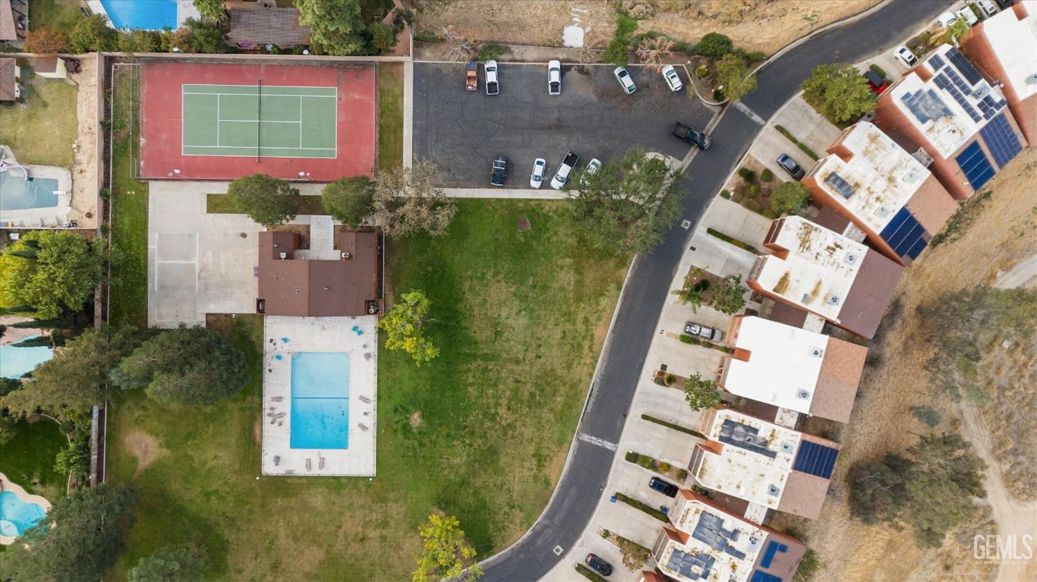 Undisclosed Address Bakersfield, CA 93306 - Photo 3 of 52 an aerial view of residential houses with outdoor space and street view