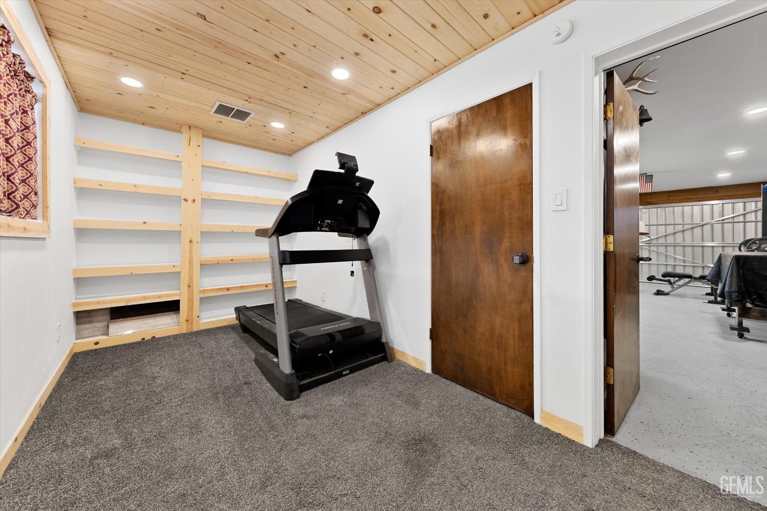 Undisclosed Address Bakersfield, CA 93306 - Photo 32 of 52 a room with walk in closet and a window