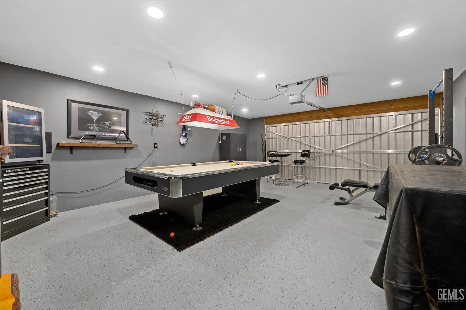 Undisclosed Address Bakersfield, CA 93306 - Photo 33 of 52 a living room with furniture and a flat screen tv