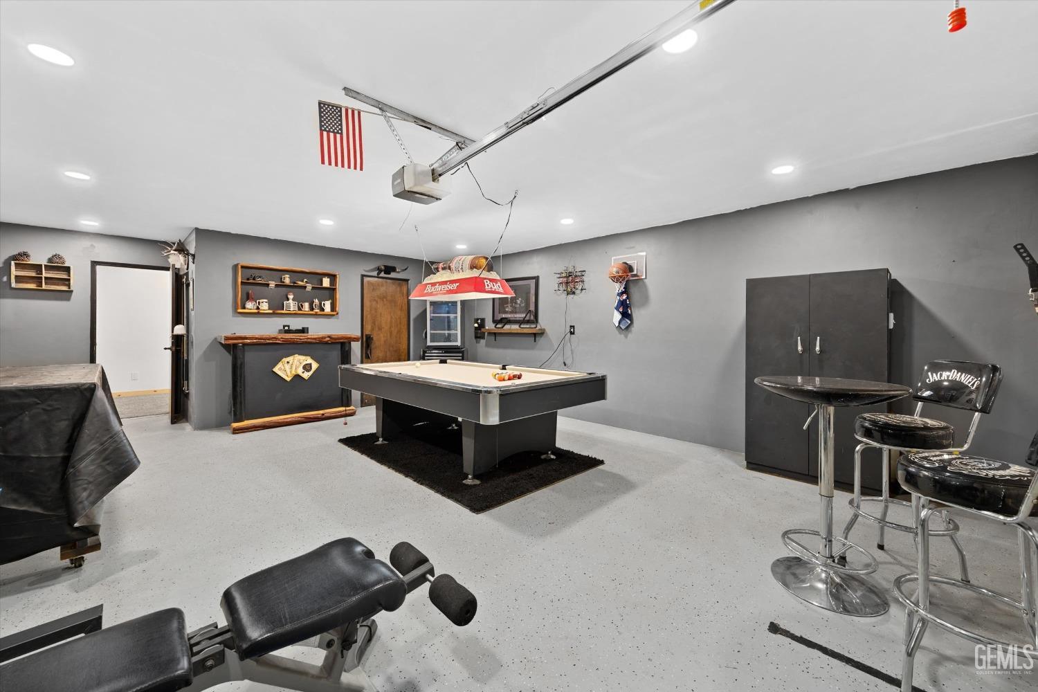 Undisclosed Address Bakersfield, CA 93306 - Photo 34 of 52 a living room with furniture and a flat screen tv