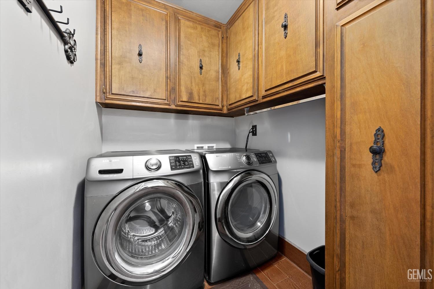 Undisclosed Address Bakersfield, CA 93306 - Photo 46 of 52 a utility room with dryer and washer