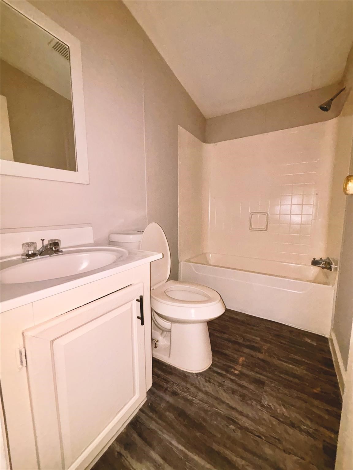 253 County Road 320 Cleveland, TX 77327 - Photo 3 of 13 a bathroom with a sink toilet and vanity