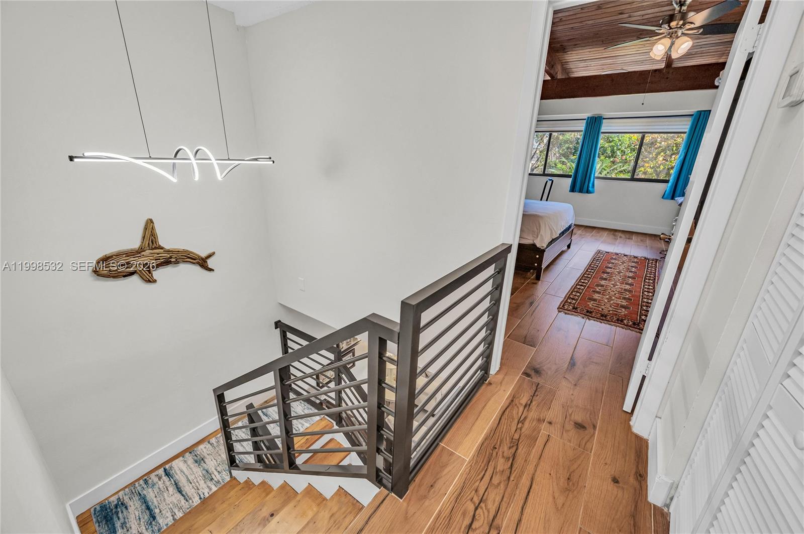 7018 Southwest 53rd Lane Miami, FL 33155 - Photo 23 of 58 a view of an entryway with wooden floor
