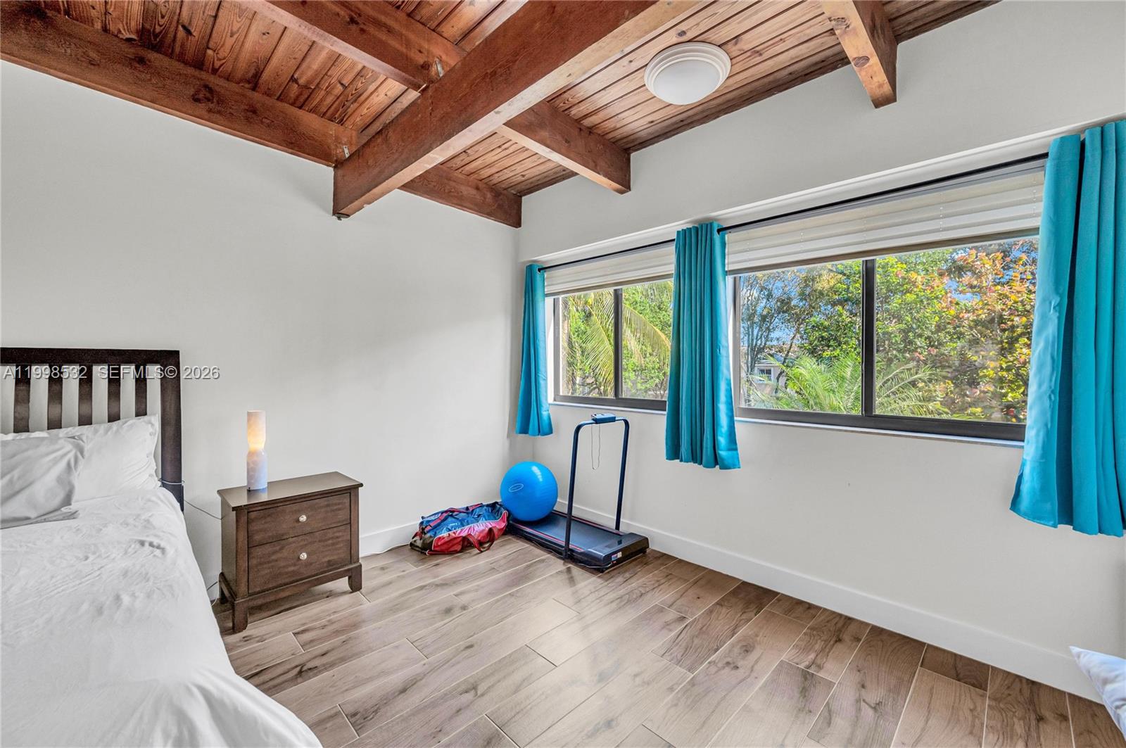 7018 Southwest 53rd Lane Miami, FL 33155 - Photo 27 of 59 a view of a room with wooden floor and furniture