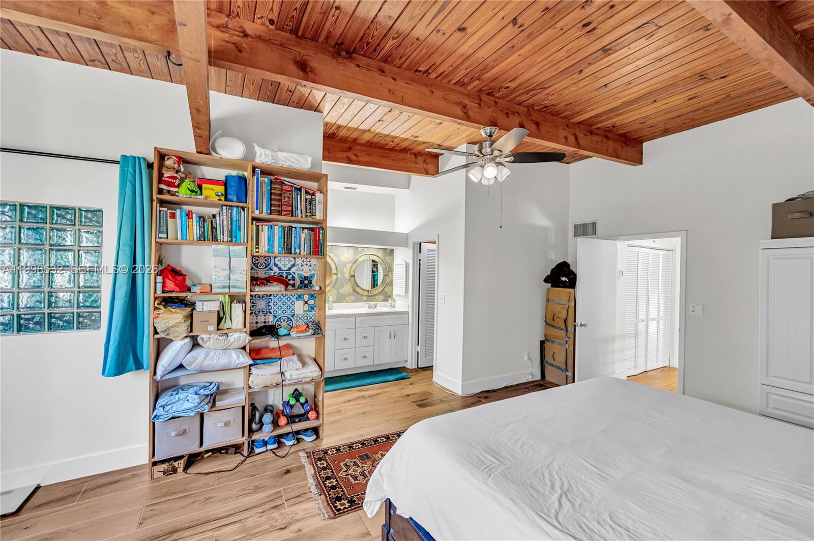 7018 Southwest 53rd Lane Miami, FL 33155 - Photo 27 of 58 a bedroom with bed and a window