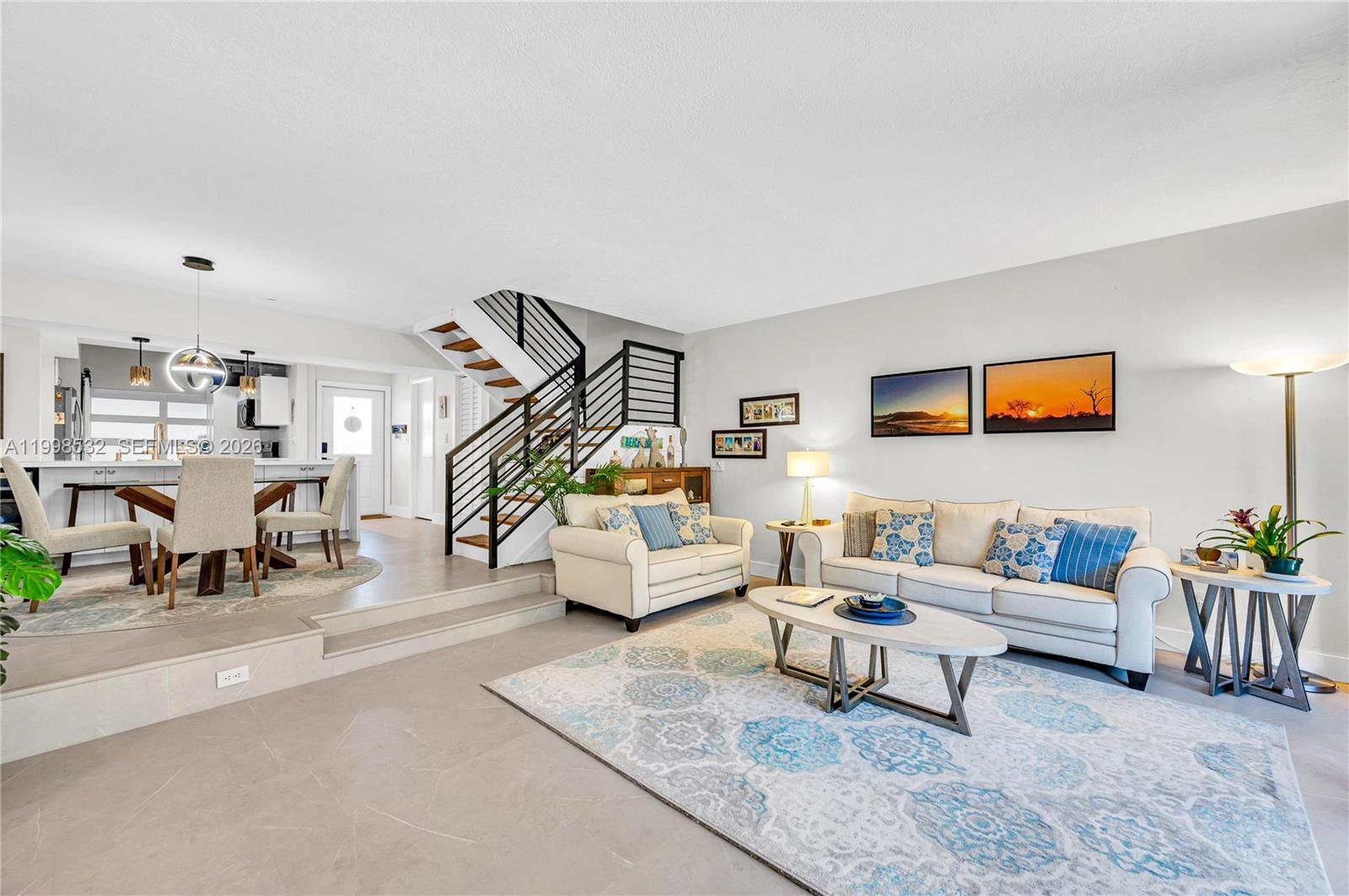 7018 Southwest 53rd Lane Miami, FL 33155 - Photo 3 of 58 a living room with furniture and wooden floor