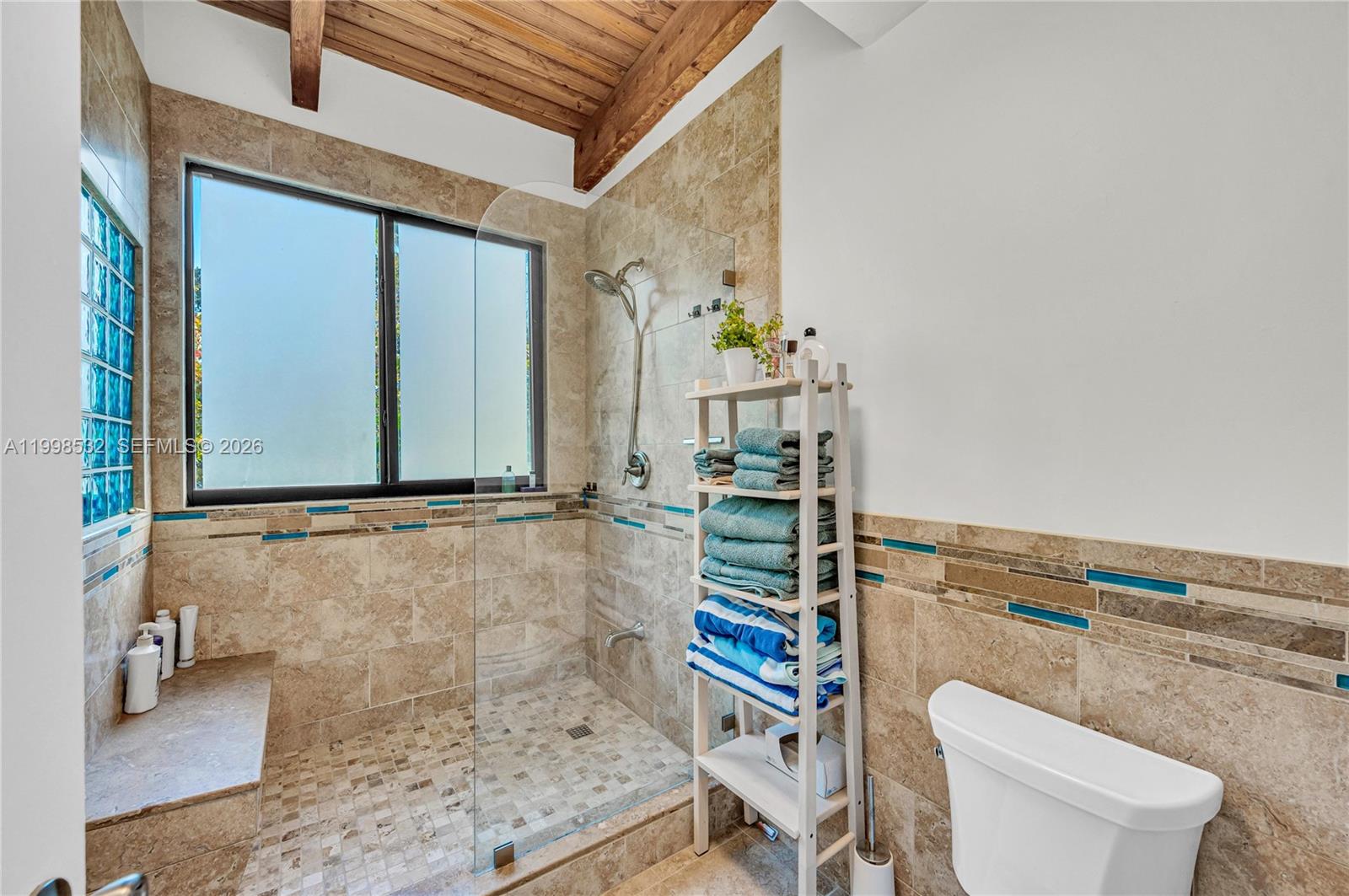 7018 Southwest 53rd Lane Miami, FL 33155 - Photo 31 of 58 a bathroom with a granite countertop sink and a toilet