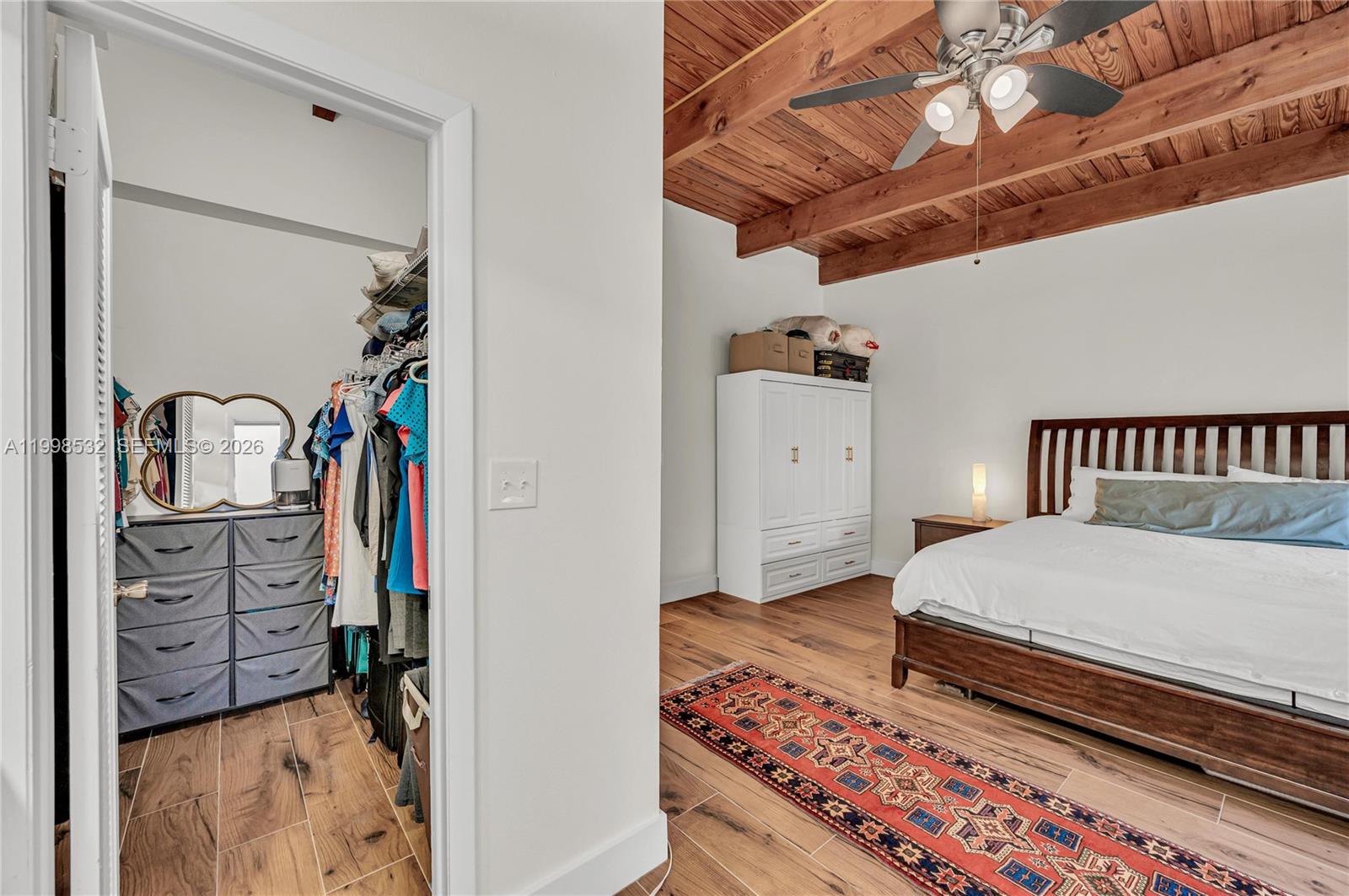 7018 Southwest 53rd Lane Miami, FL 33155 - Photo 32 of 58 a bedroom with a bed and a window