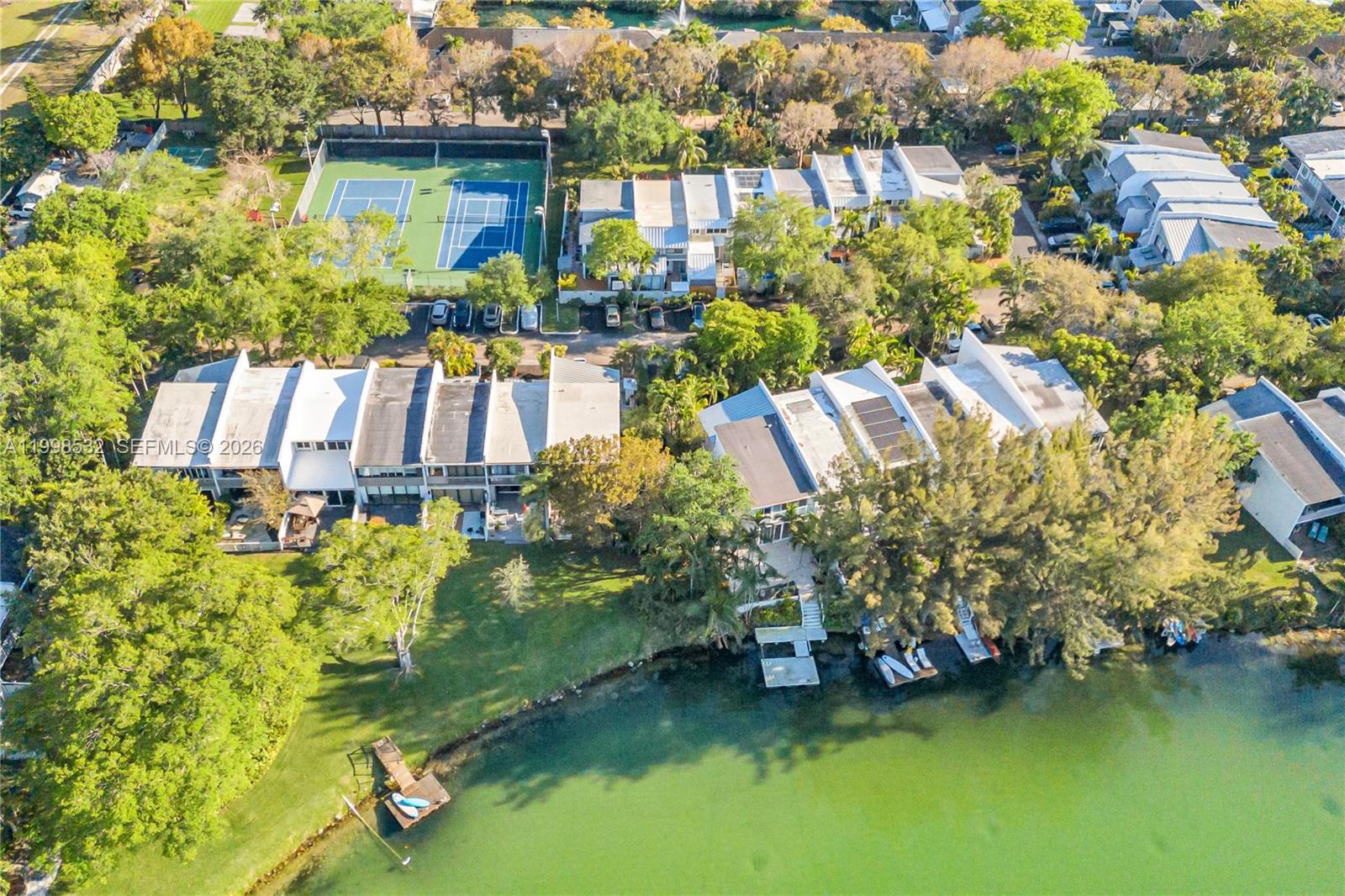 7018 Southwest 53rd Lane Miami, FL 33155 - Photo 58 of 58 a view of a lake with a house