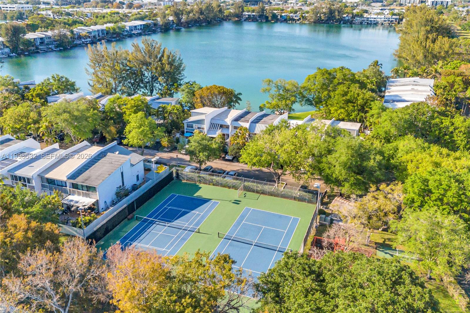7018 Southwest 53rd Lane Miami, FL 33155 - Photo 10 of 58 an aerial view of a house with a lake view