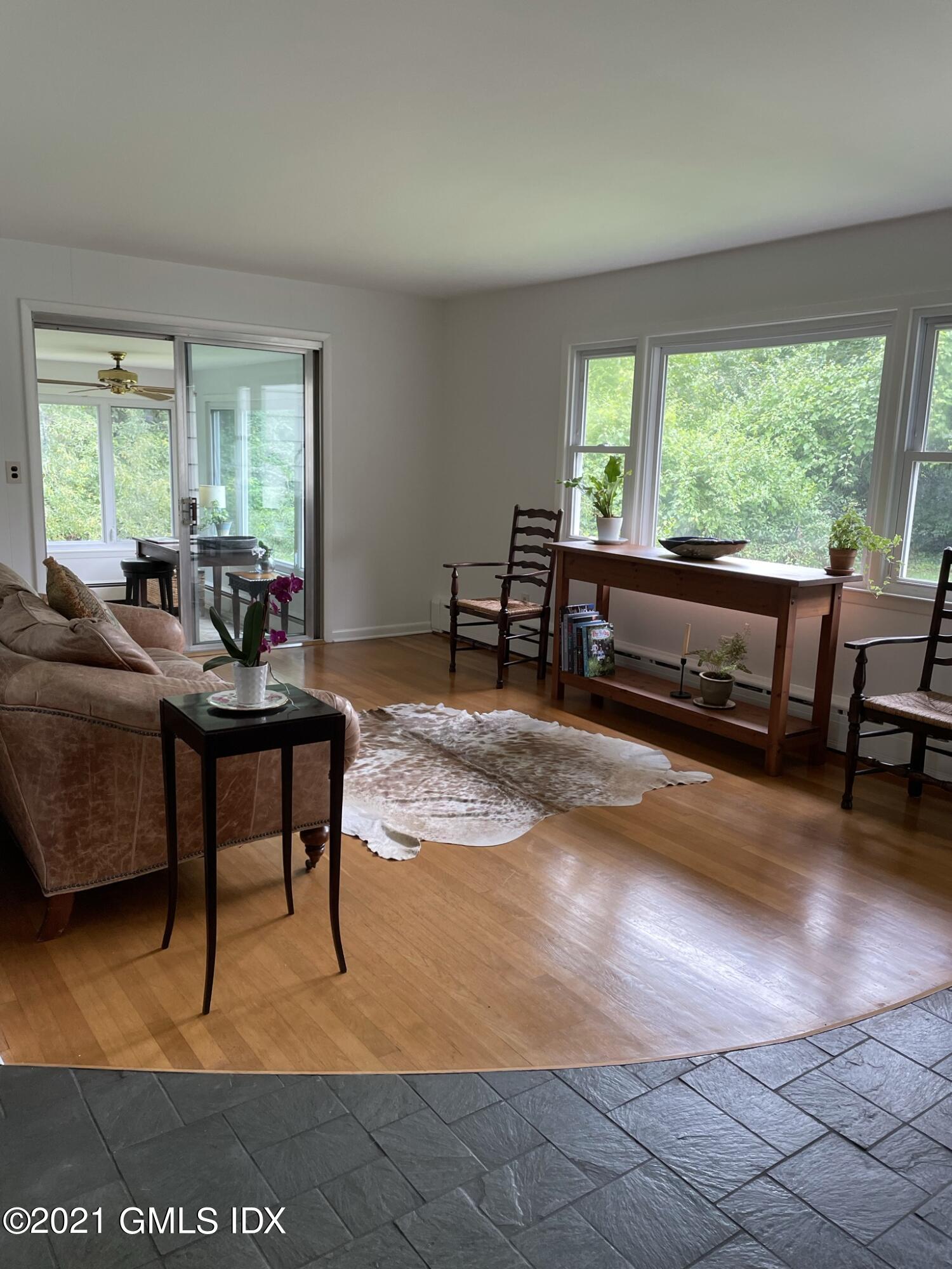 1 Norias Road Greenwich, CT 06830 - Photo 4 of 41 a living room with furniture and a large window