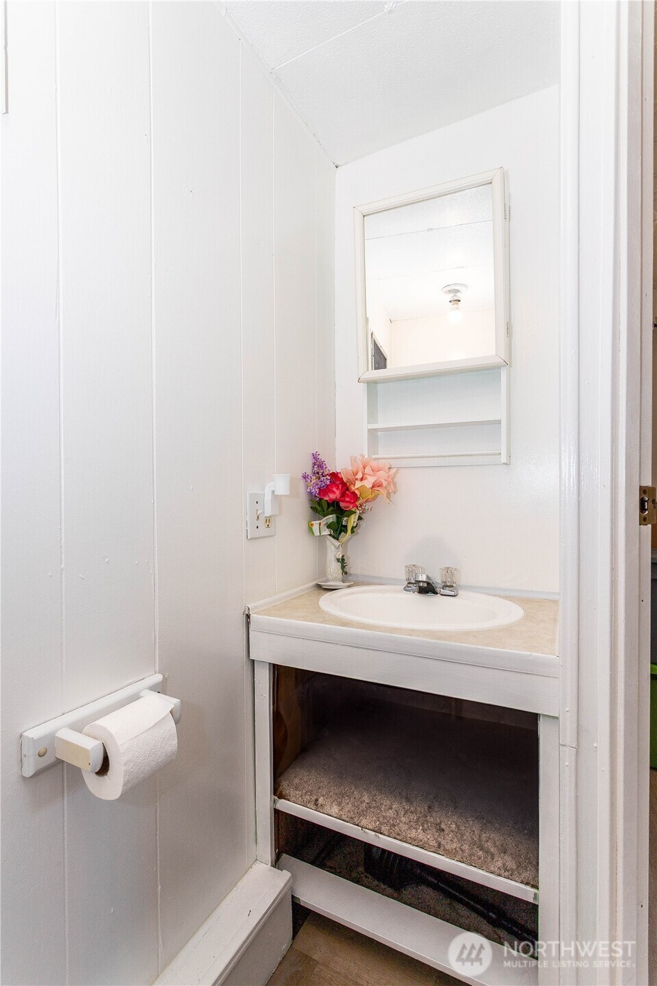 5920 200th Street Southwest, Unit 37 Lynnwood, WA 98036 - Photo 15 of 21 a bathroom with a sink and a mirror