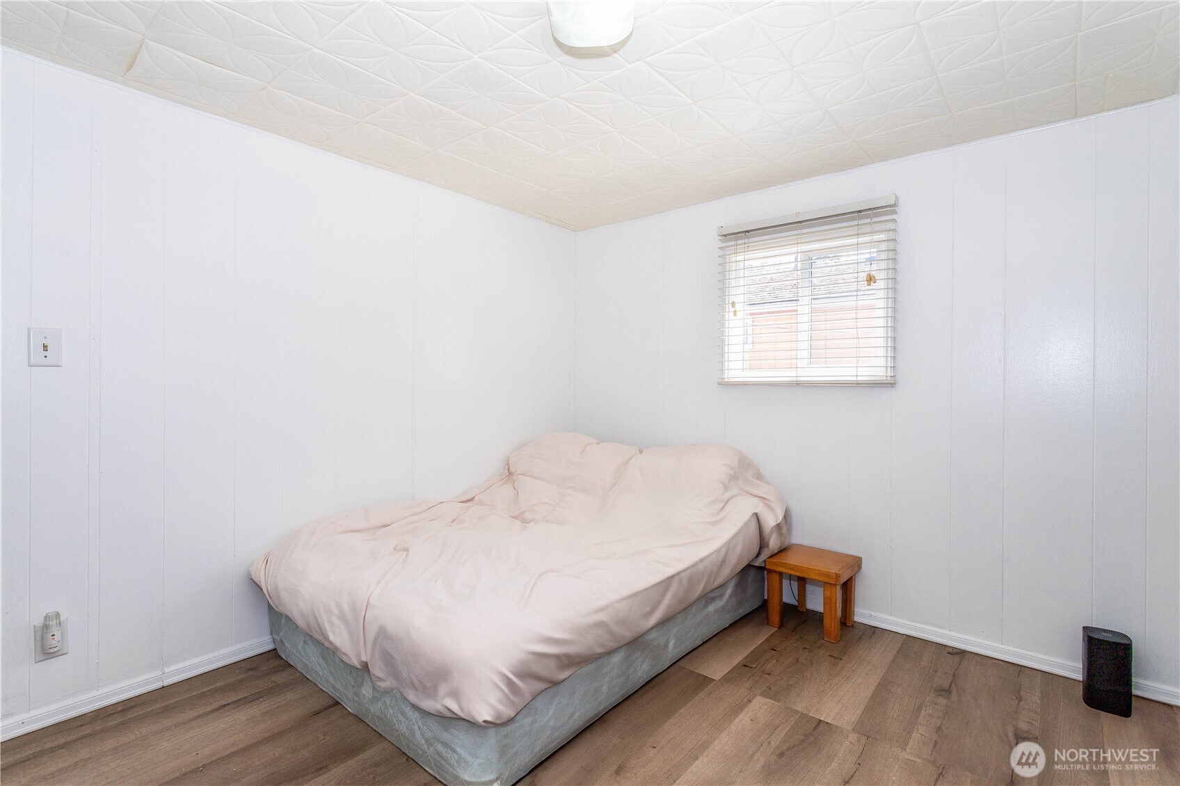 5920 200th Street Southwest, Unit 37 Lynnwood, WA 98036 - Photo 16 of 21 a bedroom with a bed and a table