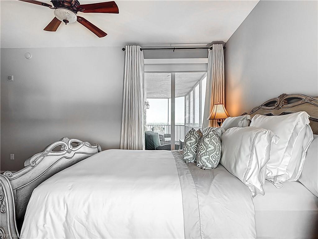 2745 First Street, Unit 1106 Fort Myers, FL 33916 - Photo 12 of 23 a bedroom with a bed and a window