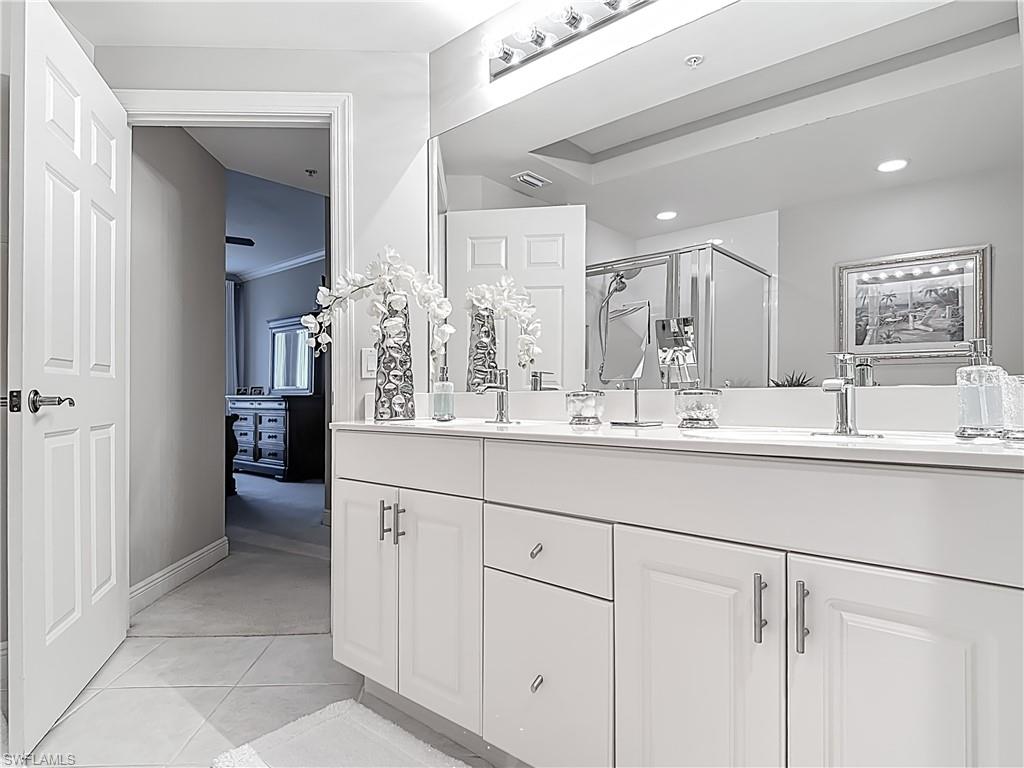 2745 First Street, Unit 1106 Fort Myers, FL 33916 - Photo 17 of 23 a bathroom with a double vanity sink and a