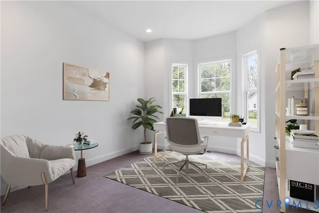 a living room with furniture a flat screen tv and a window