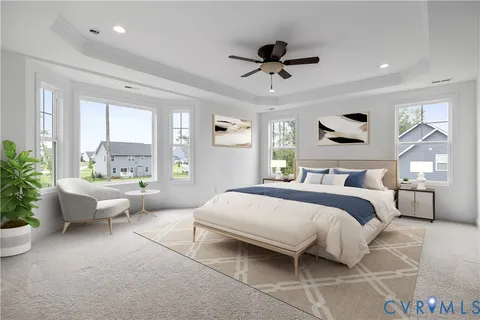 a bedroom with a large bed and a large window