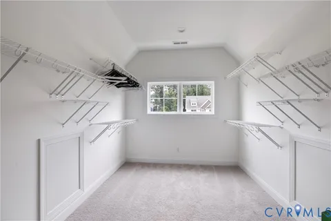 a view of a room with window and stairs