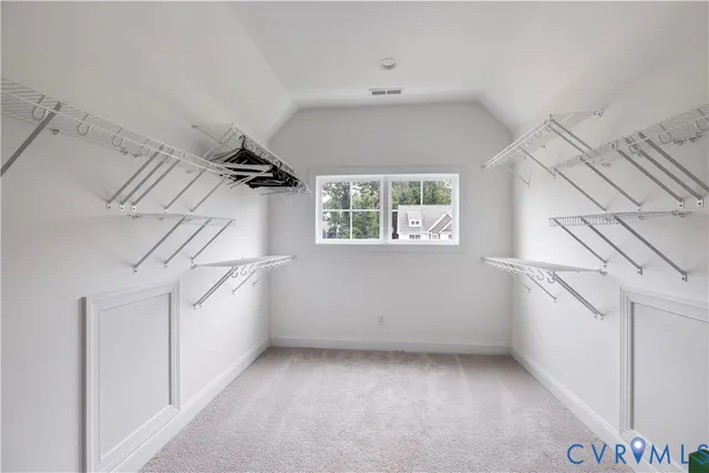 a view of a room with window and stairs