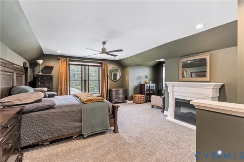 a bedroom with a bed and dresser