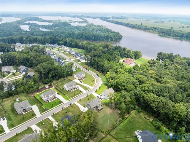 an aerial view of a house with a garden