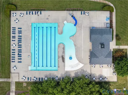 an aerial view of a swimming pool