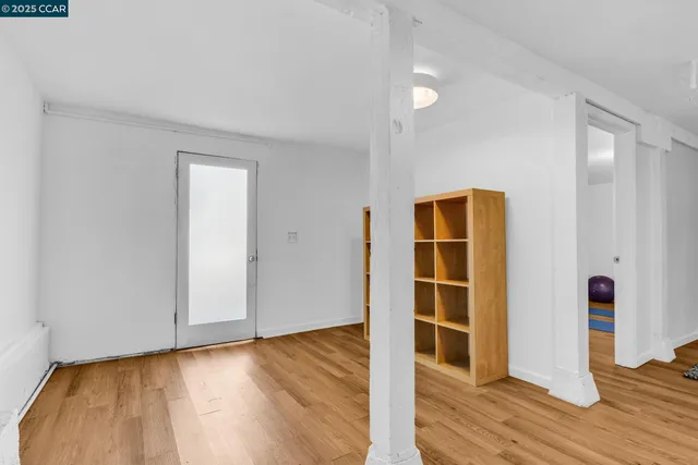 a view of a storage & utility room with washer and dryer