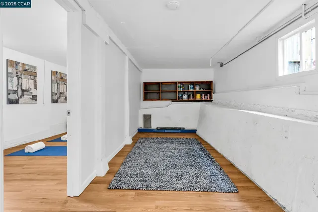 a room with window and wooden floor