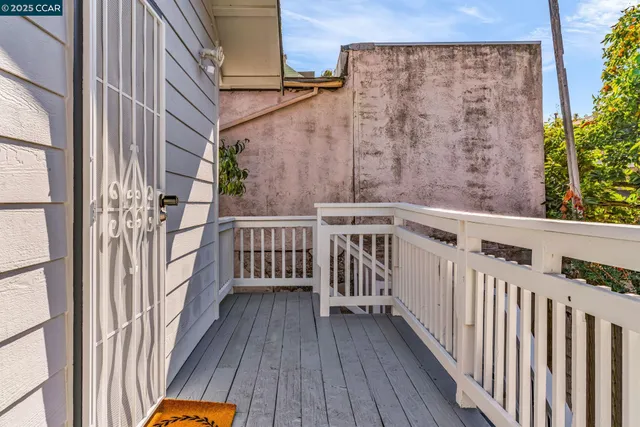 a view of a backyard with sitting area
