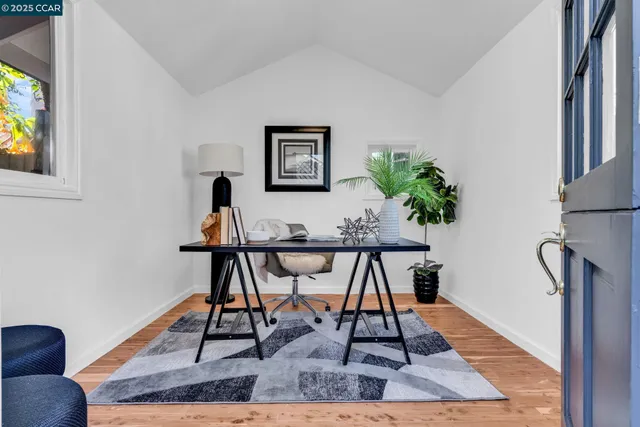 a view of a workspace with furniture