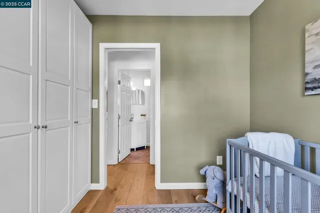 a bed room with a bed and a window