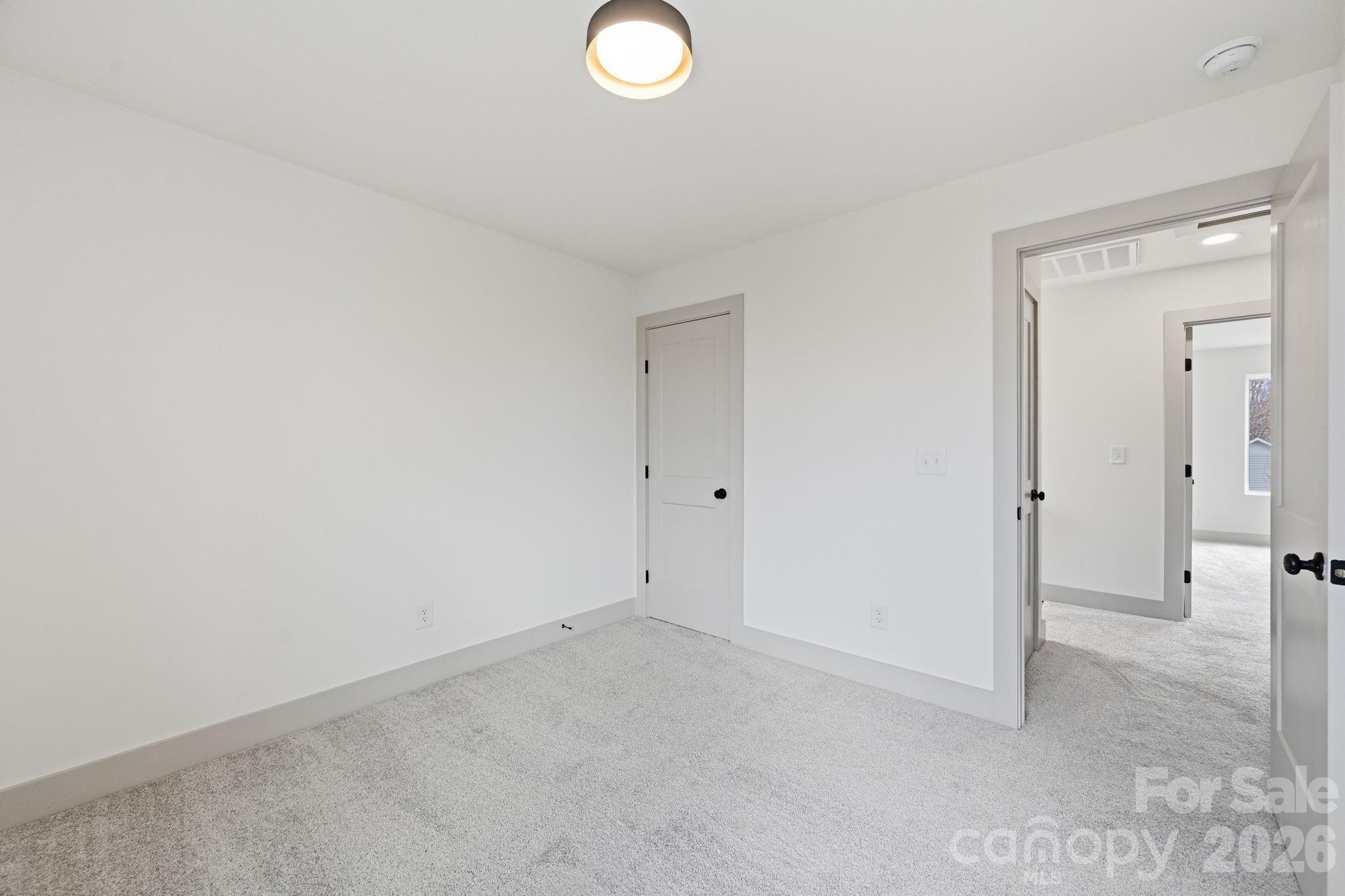 509 Beard Street Monroe, NC 28110 - Photo 28 of 33 an empty room with closet area