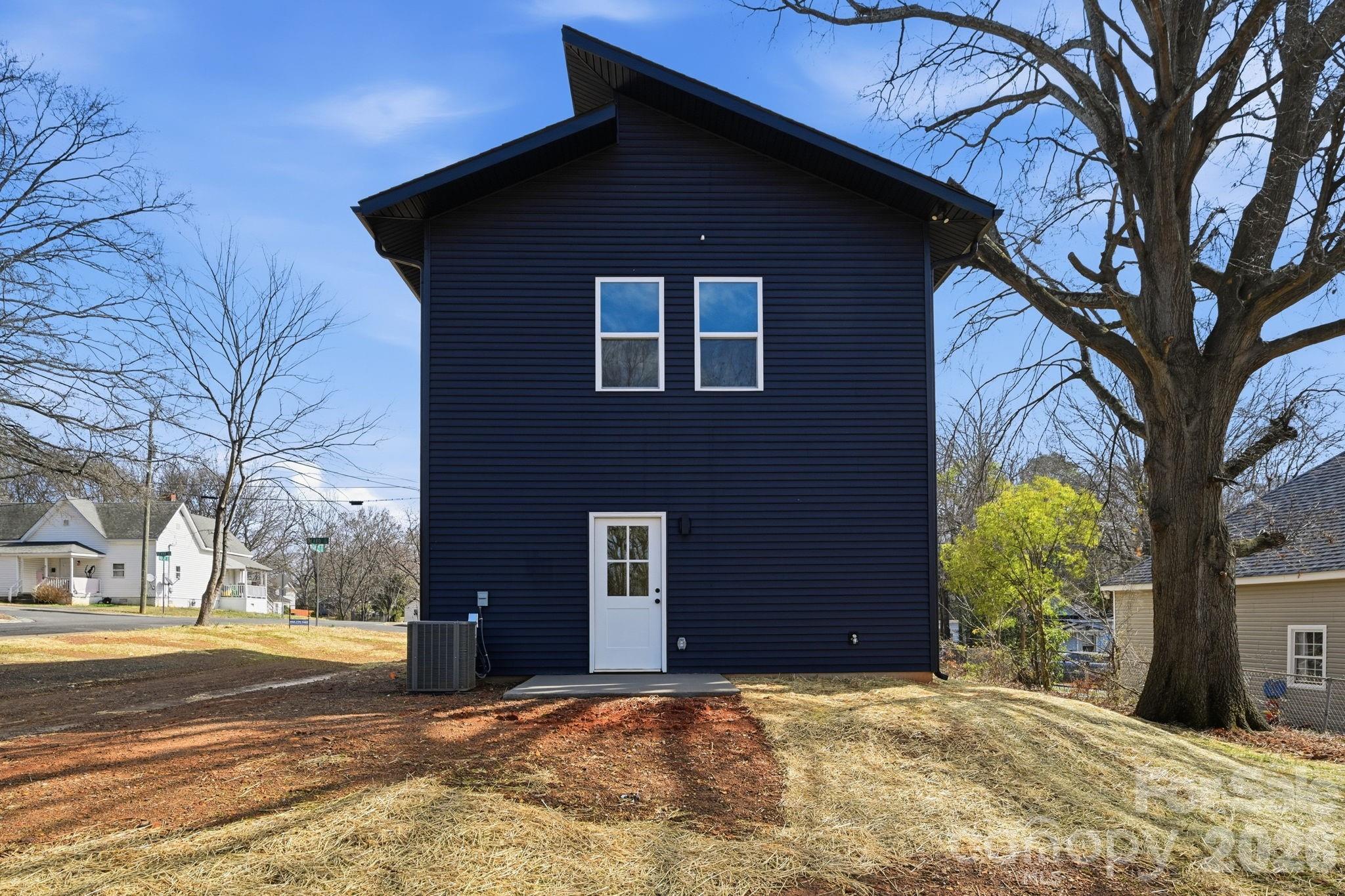 509 Beard Street Monroe, NC 28110 - Photo 30 of 33 a front view of a house with a yard