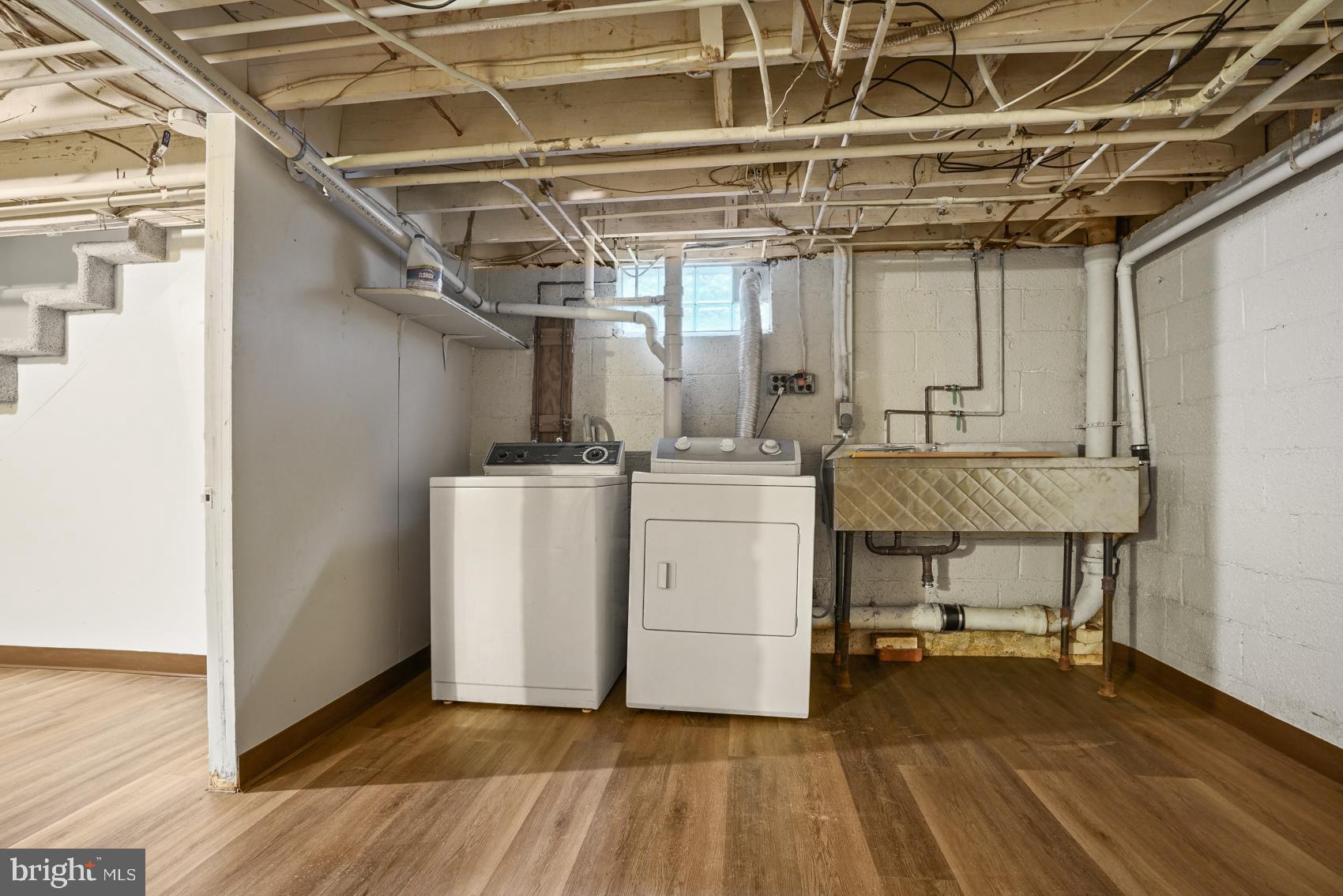 919 Valley Forge Road, Unit 1 Phoenixville, PA 19460 - Photo 21 of 25 a utility room with cabinets