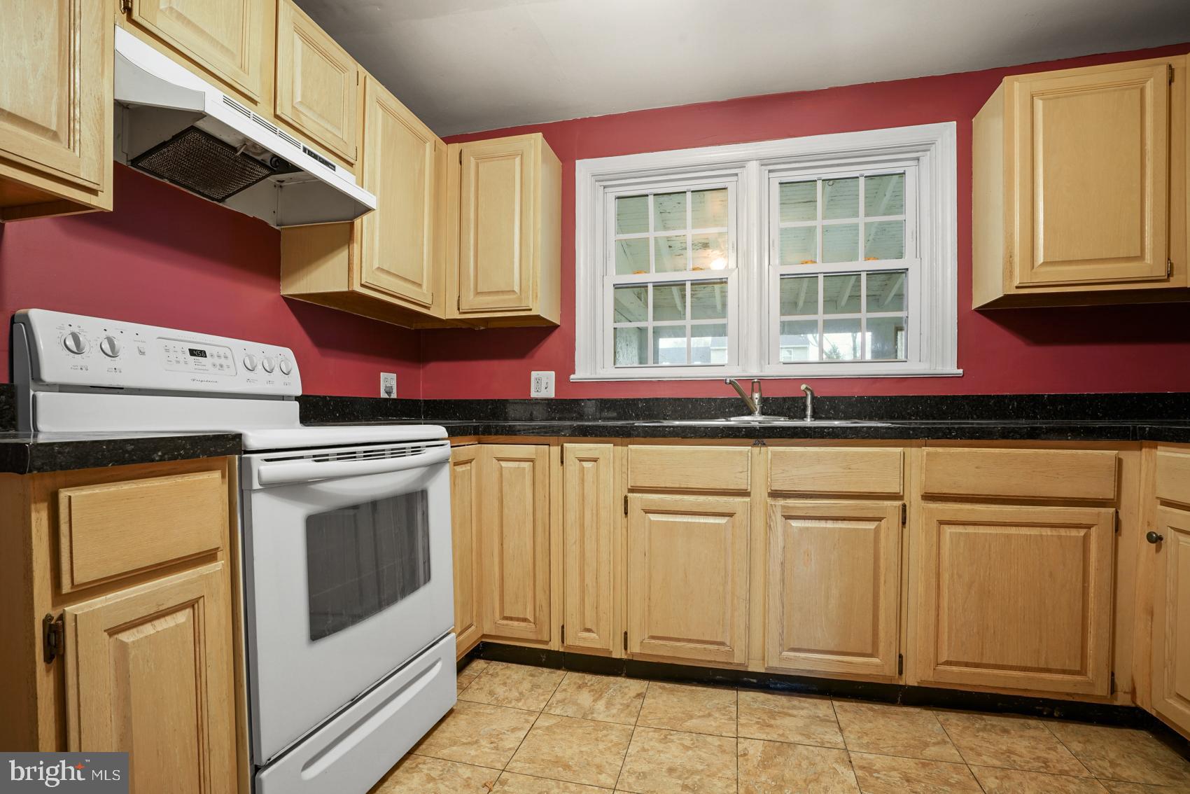 919 Valley Forge Road, Unit 1 Phoenixville, PA 19460 - Photo 4 of 25 a kitchen with a stove and a microwave