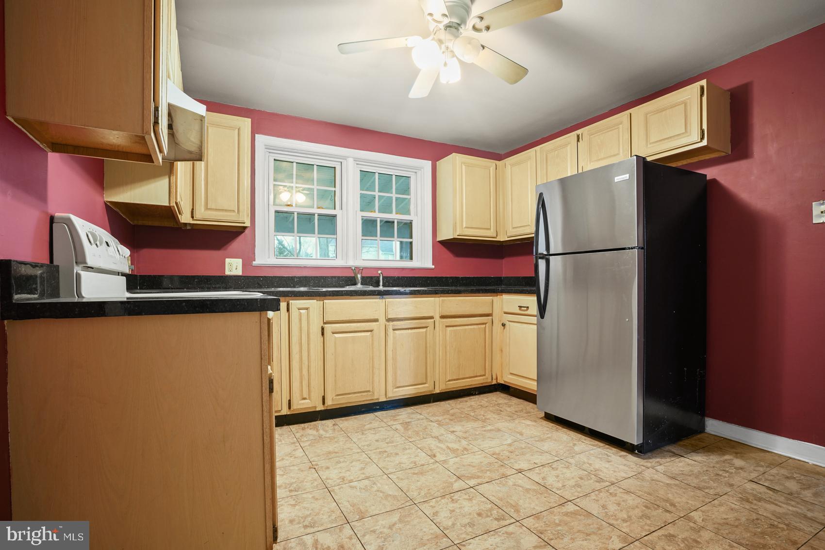 919 Valley Forge Road, Unit 1 Phoenixville, PA 19460 - Photo 5 of 25 a kitchen with stainless steel appliances a refrigerator and a more cabinets