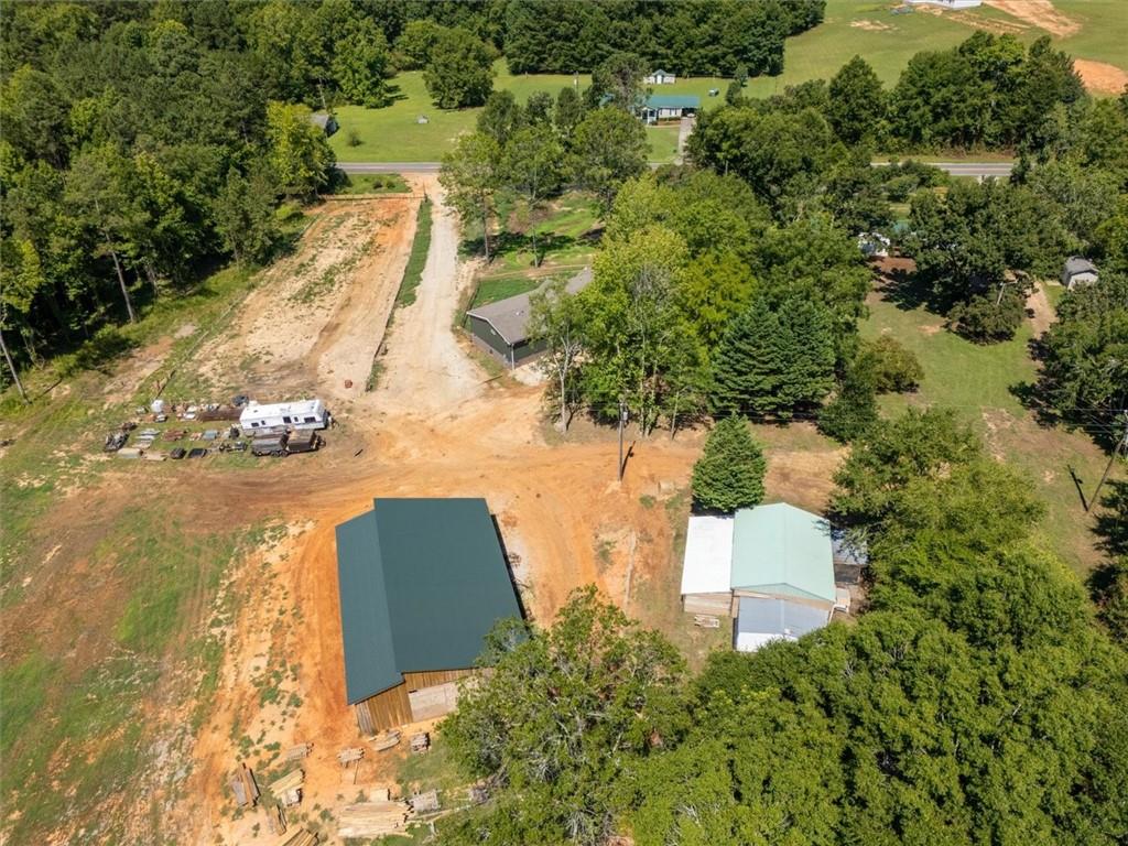 170 Anoia Road Washington, GA 30673 - Photo 43 of 46 an aerial view of a house with a yard and lake view