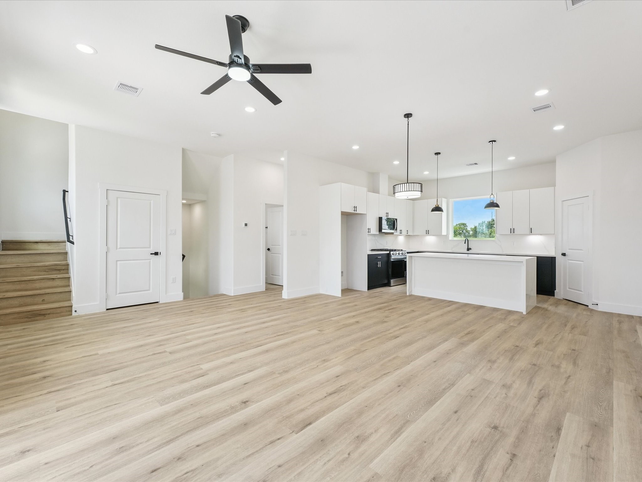 3510 Saltus Street Houston, TX 77003 - Photo 14 of 36 a view of a kitchen with a sink and a refrigerator