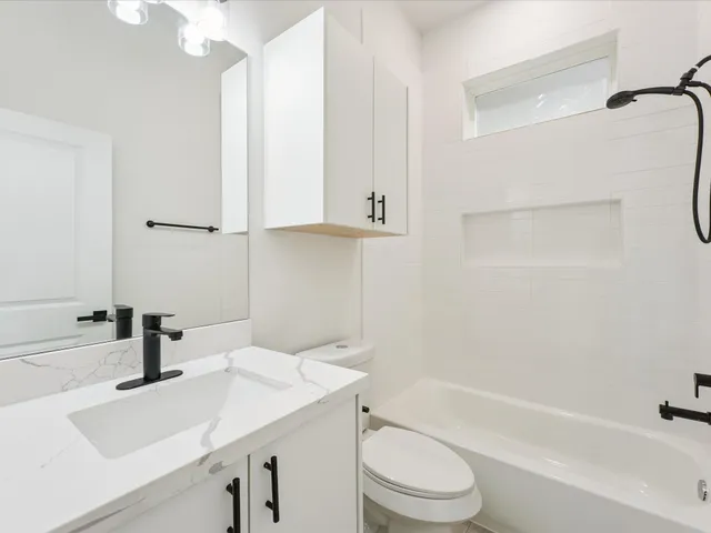 a view of a kitchen with marble kitchen and sink