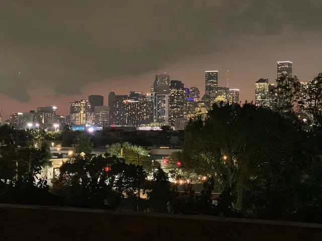 a view of swimming pool from a balcony