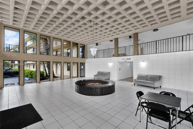 a room with furniture and a chandelier