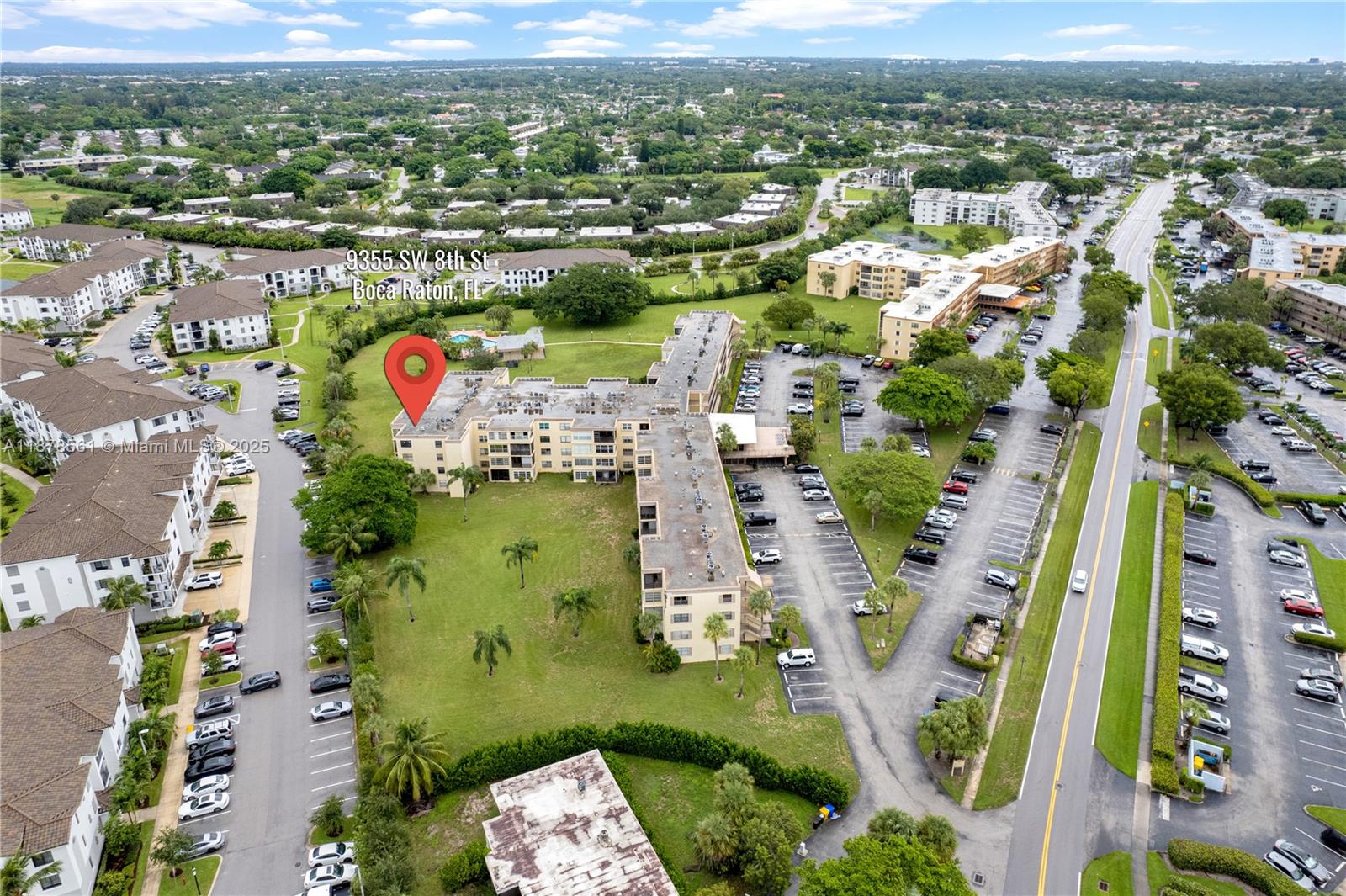9355 Southwest 8th Street, Unit 425 Boca Raton, FL 33428 - Photo 39 of 42 an aerial view of a city with lots of residential buildings