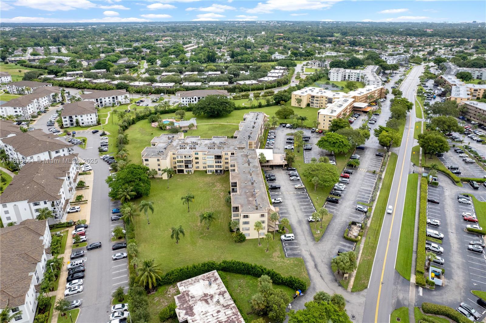 9355 Southwest 8th Street, Unit 425 Boca Raton, FL 33428 - Photo 42 of 42 an aerial view of a city with lots of residential buildings