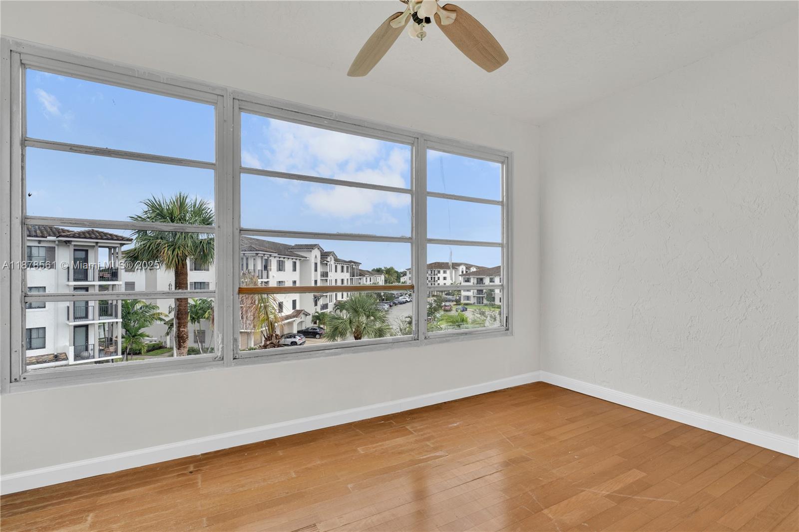 9355 Southwest 8th Street, Unit 425 Boca Raton, FL 33428 - Photo 10 of 42 an empty room with window