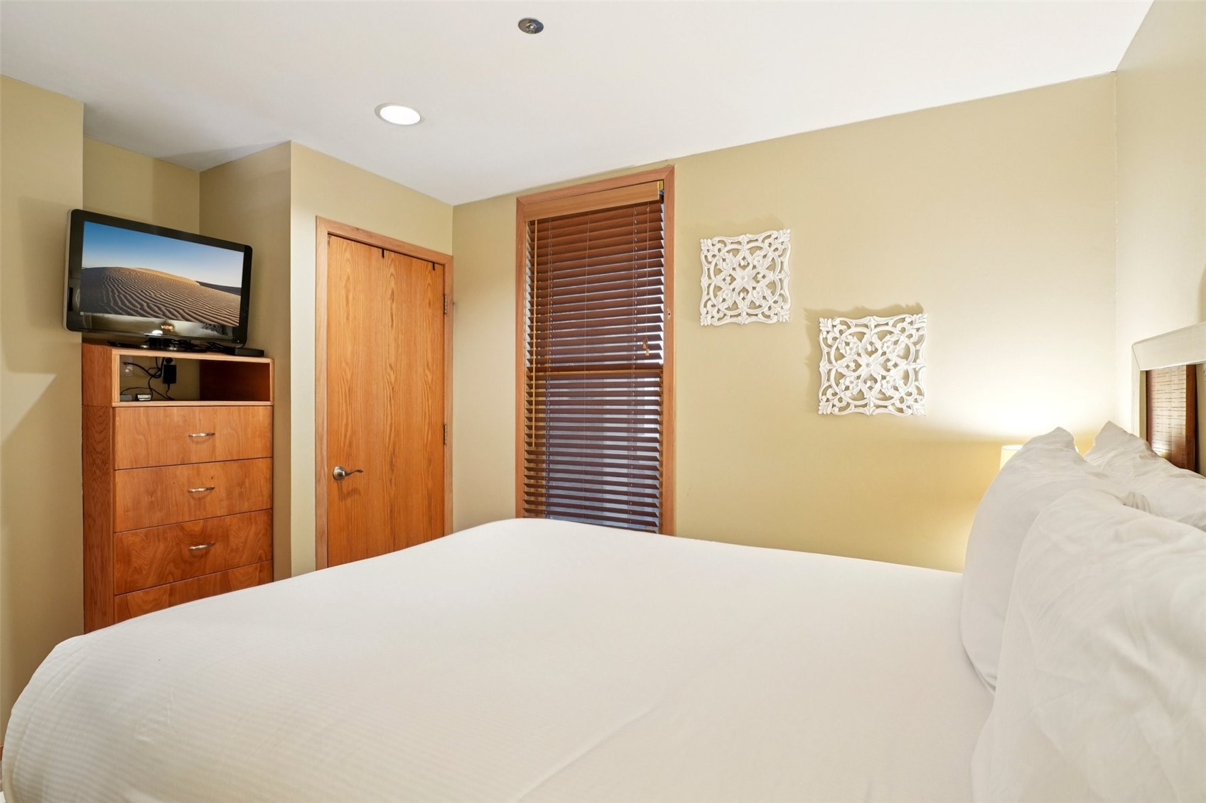24 River Run Road, Unit 2907 Keystone, CO 80435 - Photo 13 of 37 a bedroom with a bed and a flat screen tv