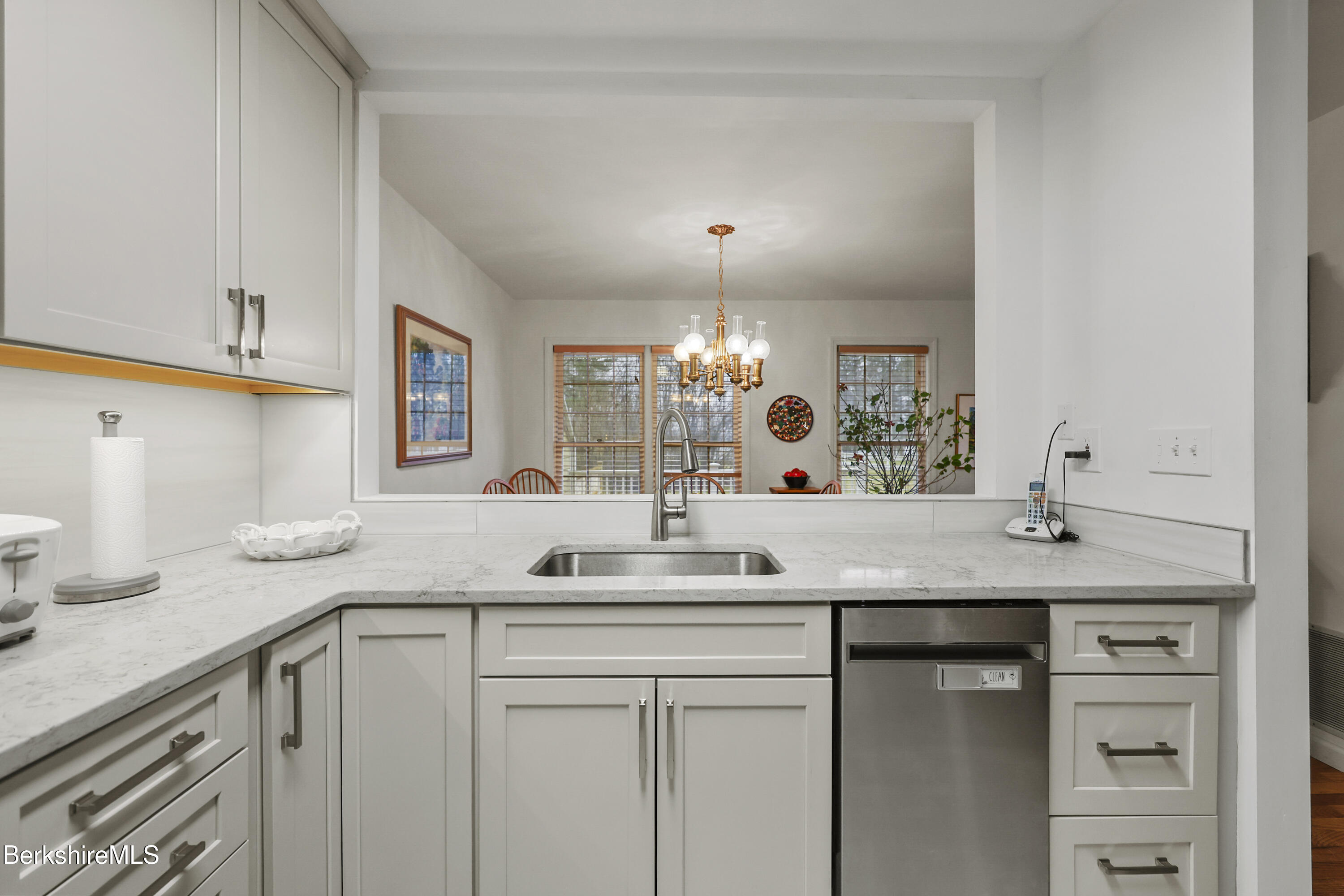 1136 Barker Road, Unit 27 Pittsfield, MA 01201 - Photo 11 of 30 a bathroom with a granite countertop sink two mirror and a