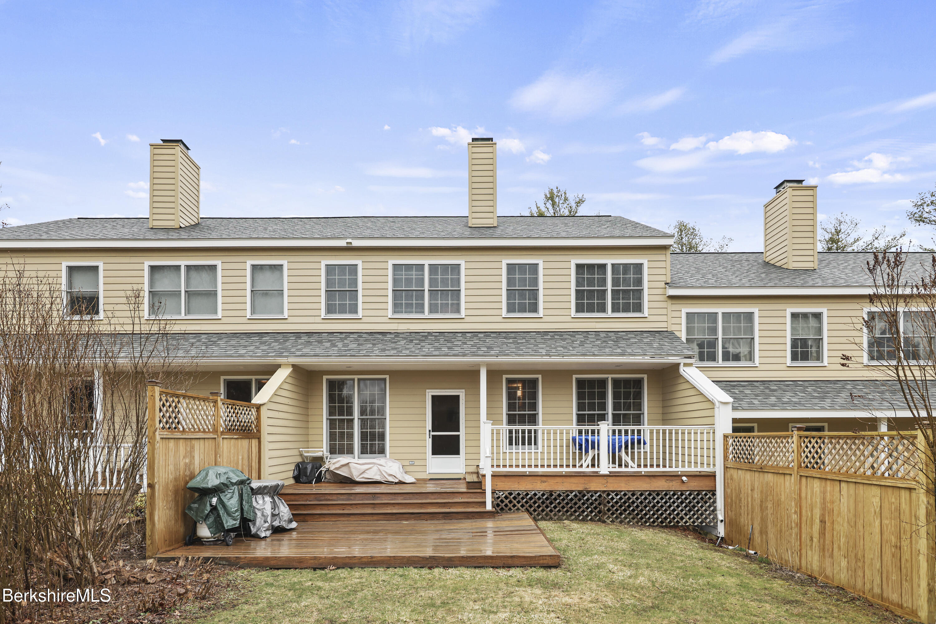 1136 Barker Road, Unit 27 Pittsfield, MA 01201 - Photo 25 of 30 a front view of a house with yard